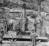 chan_wilson_sawmill-rr-in-woods-t165.jpg (9585 bytes)